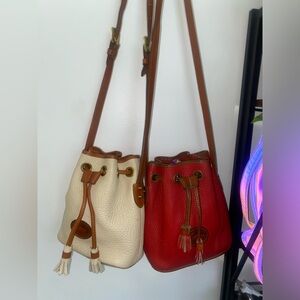 2 Dooney & Bourke red & white drawstring bags